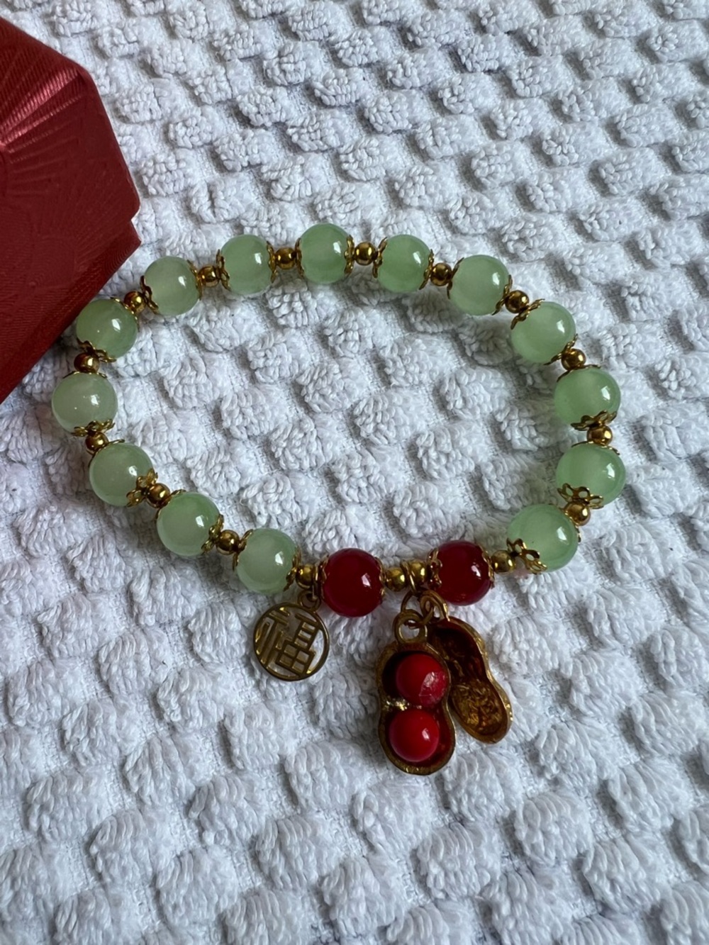 Green and Red Jade Bead Bracelet with Gold Peanut Charm - Picture 2 of 3